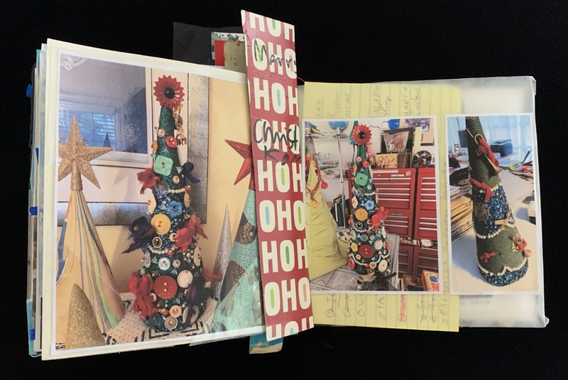 Scrapbook page with photos of a decorated cone-shaped tree, adorned with buttons and fabric flowers.