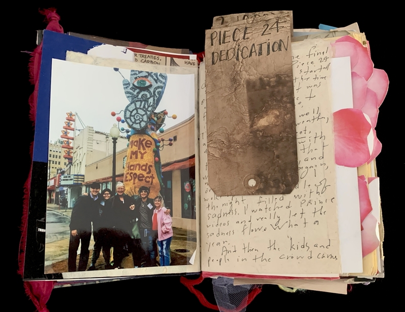 A scrapbook page featuring a photograph and handwritten notes, with decorative elements like a pink flower and a torn piece of paper.