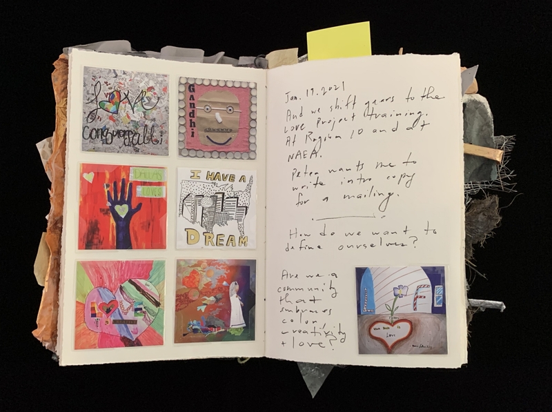 A scrapbook page featuring various artworks, doodles, and handwritten notes.