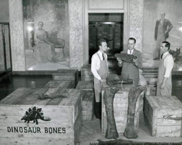 Museum director C Bertrand Schultz with museum staff. Elizabeth Dolan portraits of Charles and Harriet Morrill are in background.