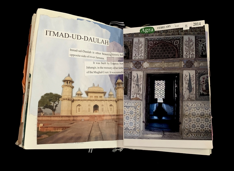 Open book showing images and text about Itmad-ud-Daulah with a date tab indicating February 8, 2014.