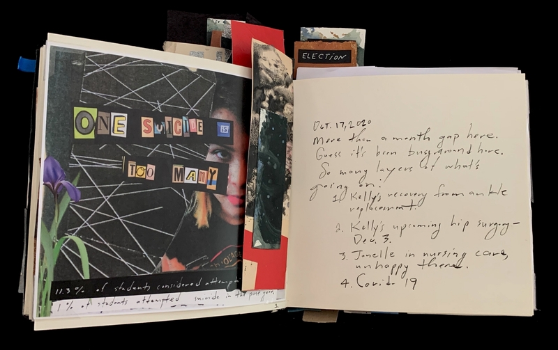 Open journal with a collage and handwritten notes on visible pages.