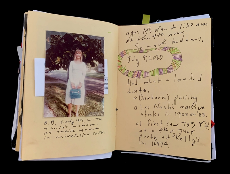 A handwritten journal page featuring a photograph and various notes, including a date and a reflection on significant events.