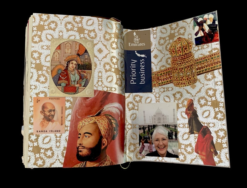 A scrapbook page featuring a variety of images related to Indian culture and history, including a portrait of a woman in traditional attire, a stamp with Mahatma Gandhi's image, and a photograph of the Taj Mahal.