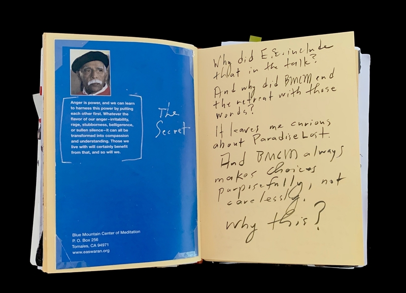 A page from a book with a photograph and handwritten notes.
