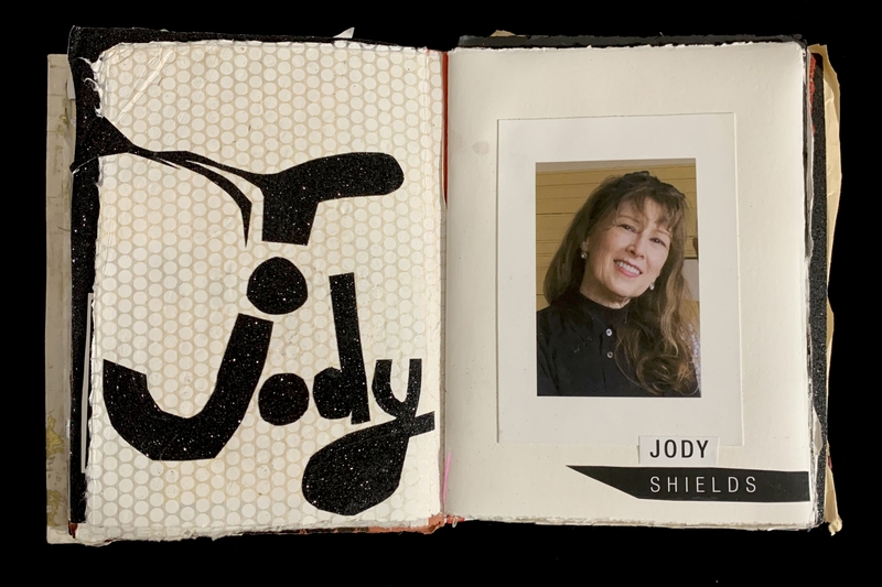 Open book showing a decorative "Jody" design and a portrait photo labeled "JODY SHIELDS".