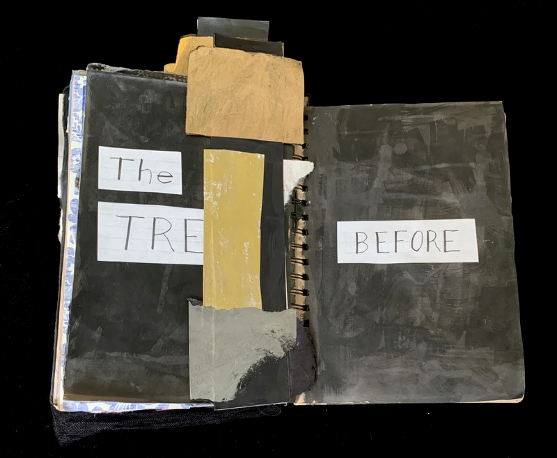A mixed-media collage in a spiral-bound notebook with text and abstract elements.