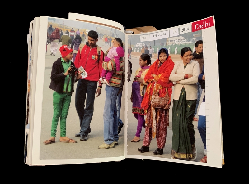 An open book showing people in traditional attire in Delhi on February 16, 2014.