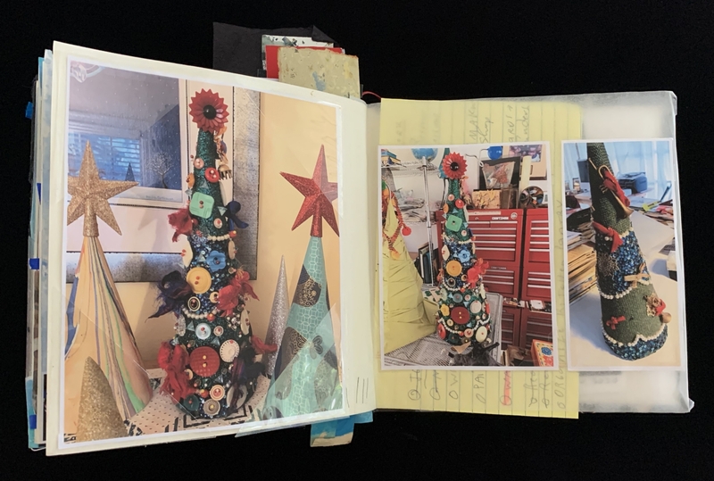 Scrapbook page with photos of a decorated cone-shaped tree, adorned with buttons and fabric flowers.