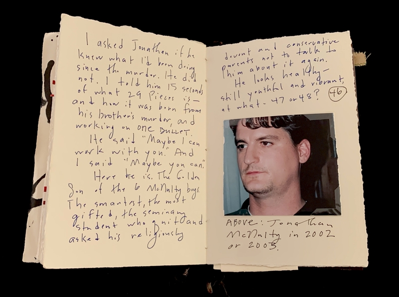 Open notebook with handwritten text and a photograph of a man.