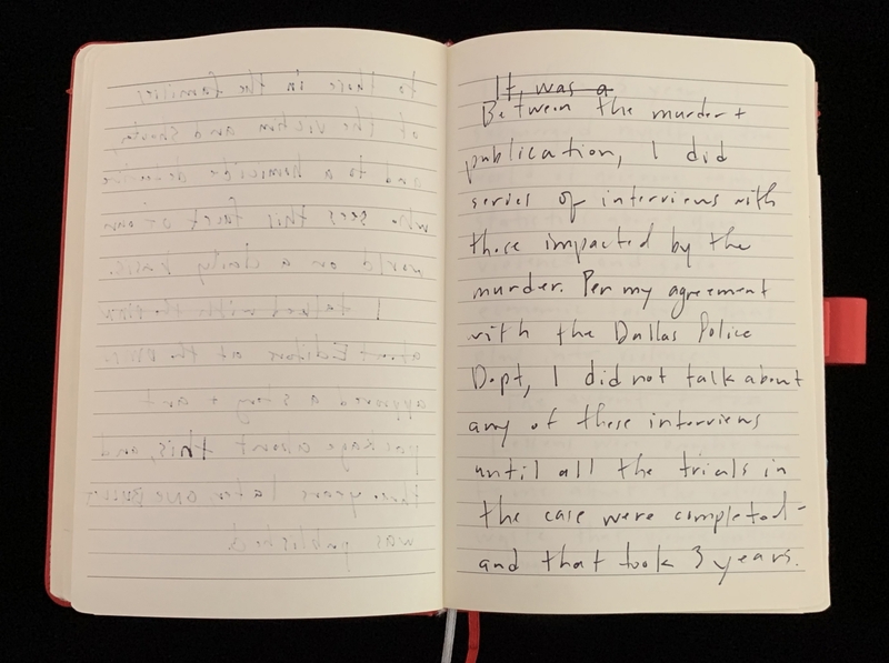Open notebook with handwritten text on both pages, detailing interviews related to a murder.