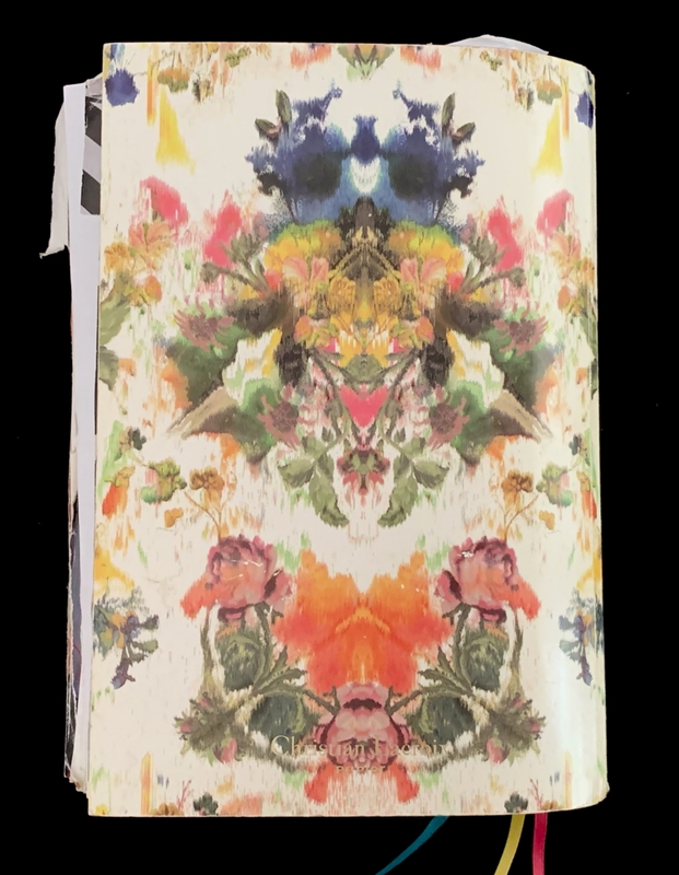 Journal cover with colorful abstract floral design.