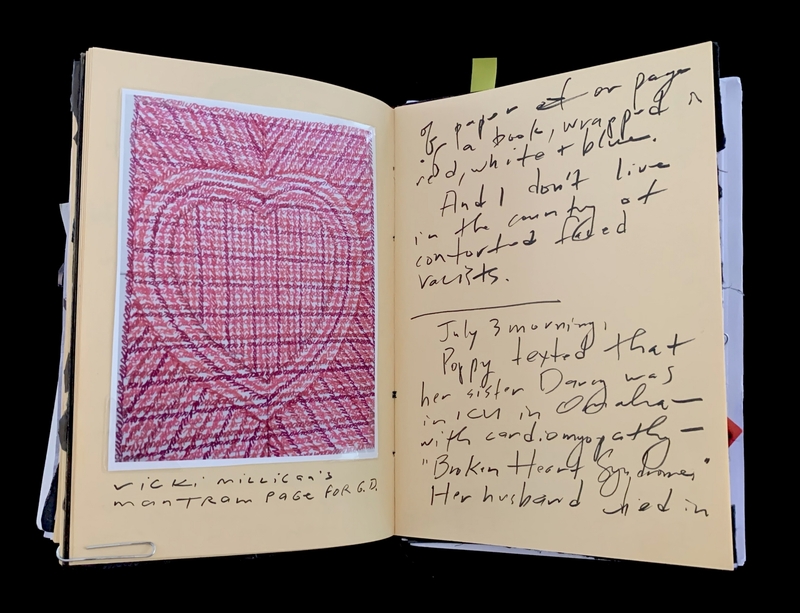 A journal page featuring a red heart drawing and handwritten notes.