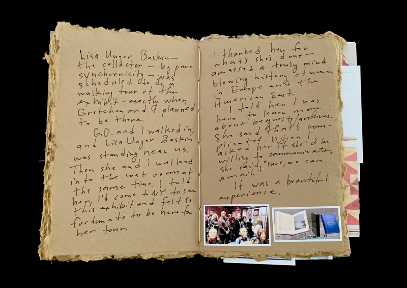 Open book with handwritten text and small photos at the bottom of the right page.
