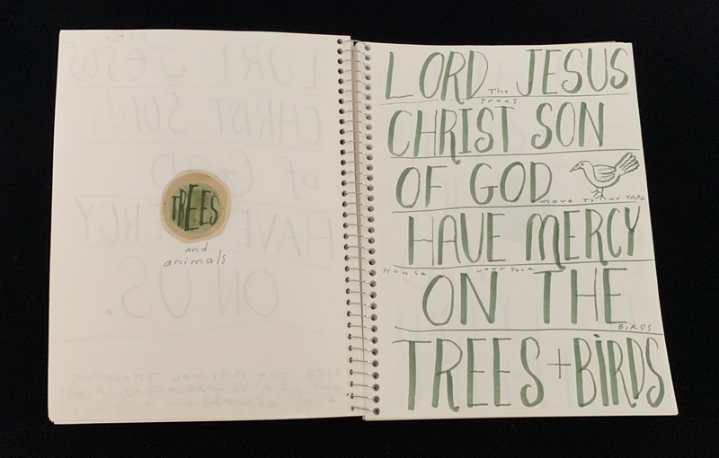 A handwritten page with a circular sticker and text referencing trees and animals, alongside a prayer for mercy on trees and birds.