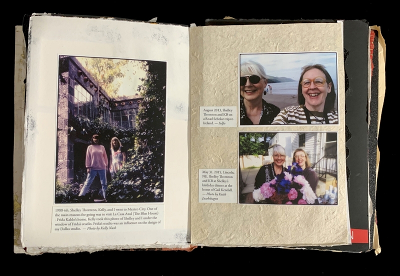 Open scrapbook with three photos of two women in different settings: in front of a stone building, on a beach, and outside with flowers.