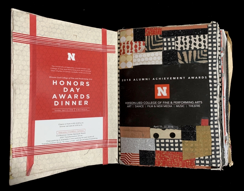 Open book showing event invitations with artistic and geometric designs.