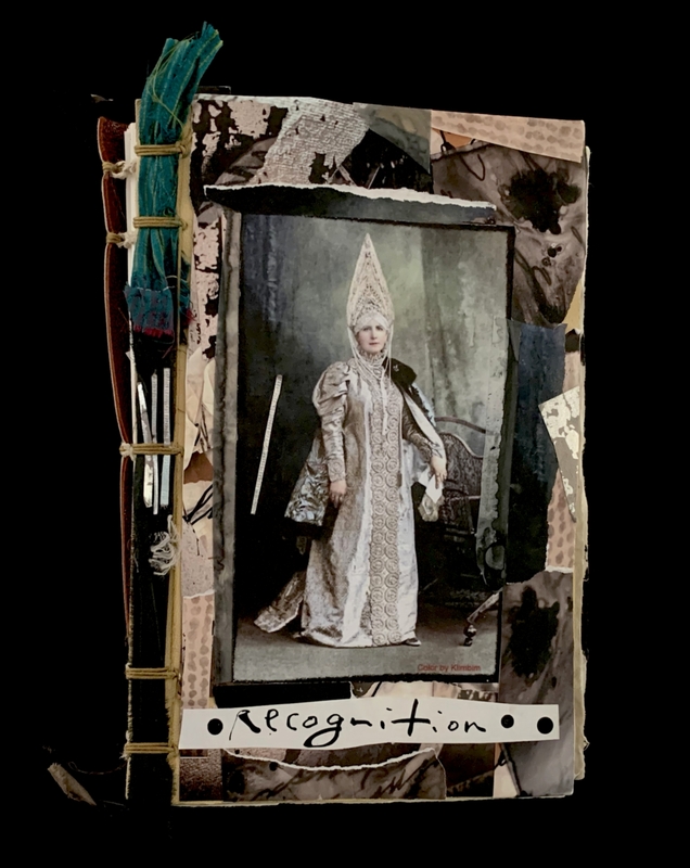 A handmade book with a photo collage cover featuring a vintage image of a person in ceremonial attire and the word "Recognition."