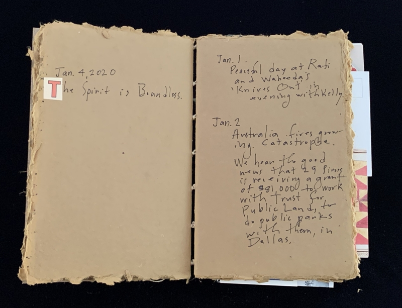 Open journal showing dated entries about personal activities and events.