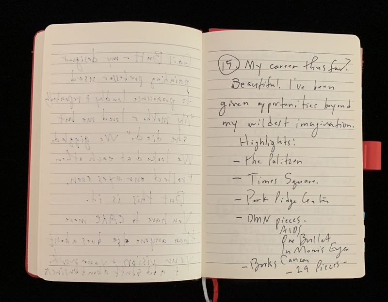 Open notebook with handwritten notes on both pages; right page contains a list of career highlights.