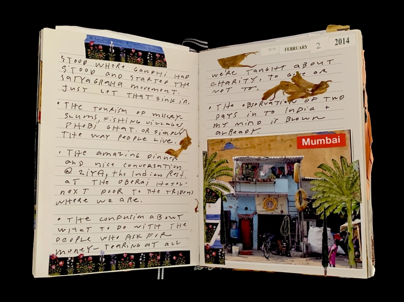 Open notebook with handwritten notes, dried leaves, floral tape, and a small "Mumbai" photo.