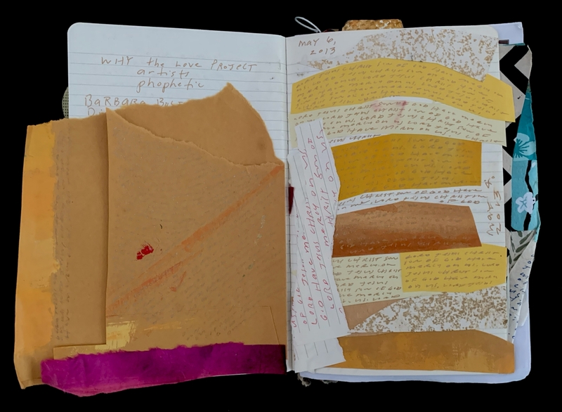 An open notebook with layered papers and handwritten notes.