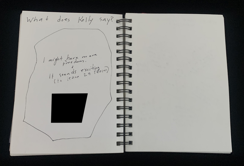 A handwritten note in a spiral-bound notebook with a question and a partial response.