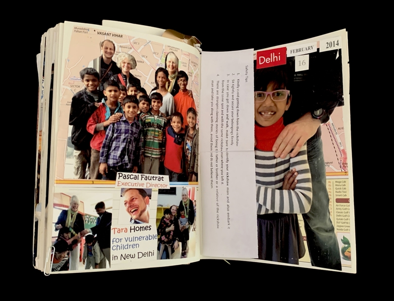 A scrapbook page featuring photographs and text related to a visit to Delhi in February 2014, highlighting safety tips and visits to Tara Homes for Vulnerable Children.