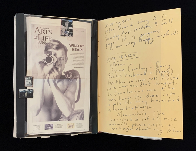 A page from a scrapbook or journal featuring a magazine clipping and handwritten notes.