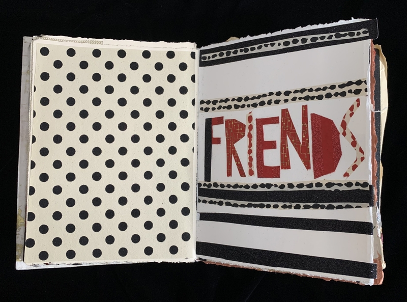 An open book with a polka dot pattern on the left and the word "FRIENDS" in red on a striped background on the right.