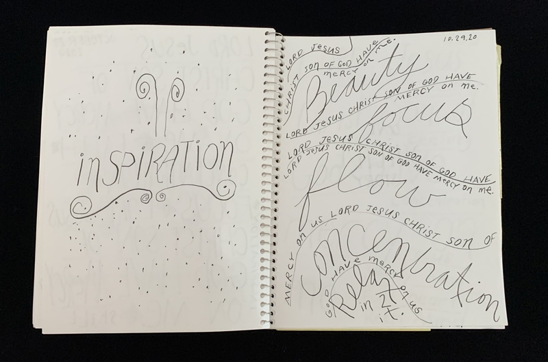 A handwritten page with various phrases and decorative elements, including the word "INSPIRATION" prominently displayed.