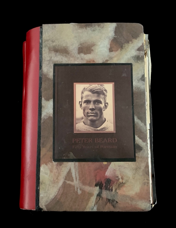 A book cover featuring a portrait of a man with the title "Peter Beard: Fifty Years of Portraits."