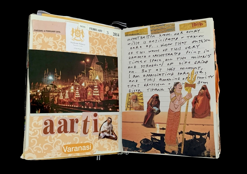 Open scrapbook with an evening photo of Ganga Aarti and a handwritten note with decorative elements.