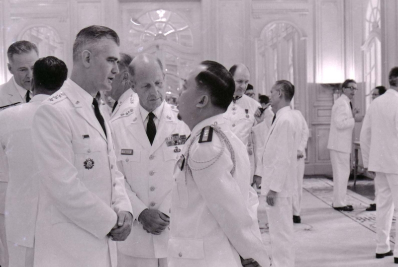 Nguyá»…n KhÃ¡nh at a formal meeting.