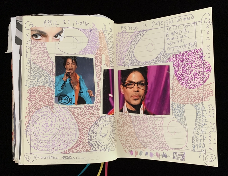 Open journal pages with photos of Prince surrounded by colorful spirals and handwritten text.