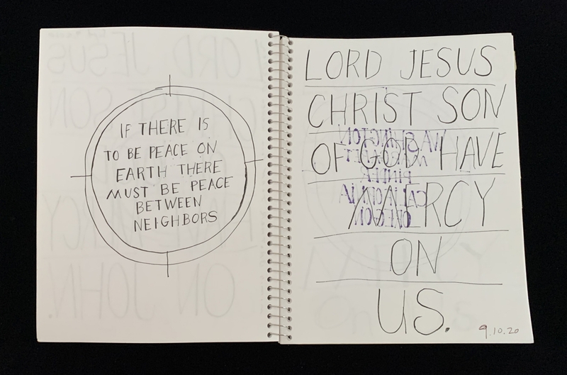 A handwritten page with a circle and text discussing peace and a prayer to Jesus.