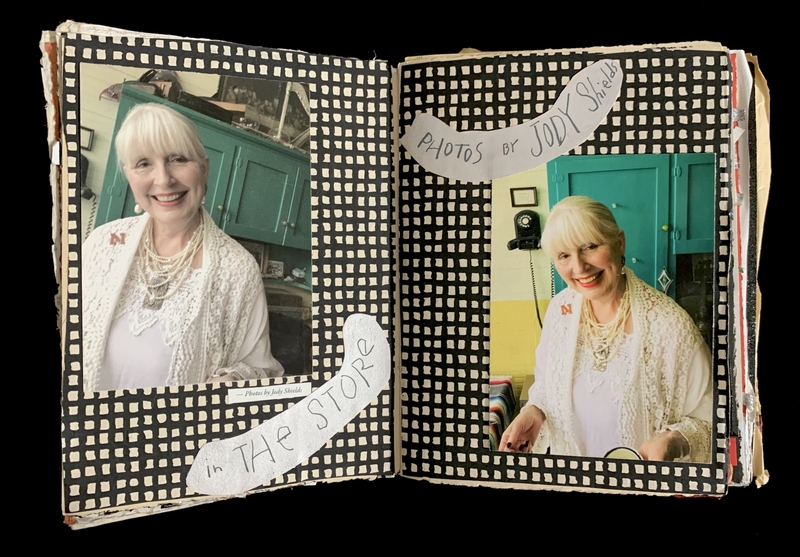 An open book spread with two portraits of a woman in white, featuring a checkered black and white background.