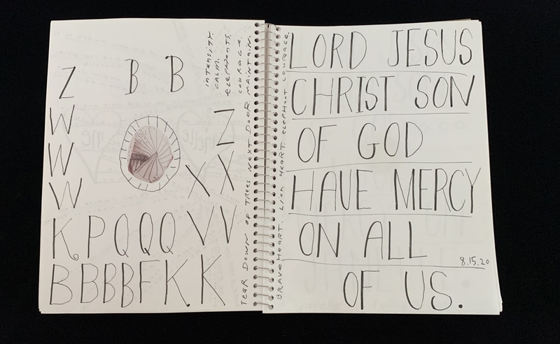 A spiral-bound notebook page featuring various calligraphy练习 and a prayer.