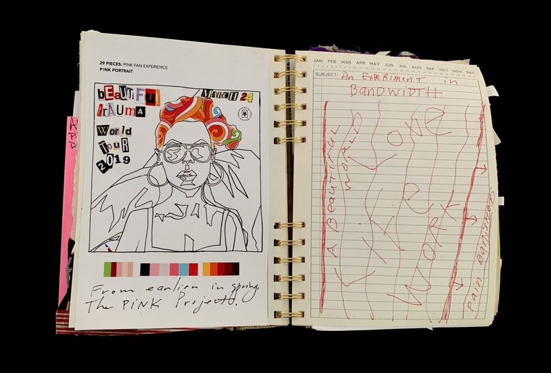 A journal page featuring a drawing of a person with colorful hair, alongside handwritten notes and a calendar.