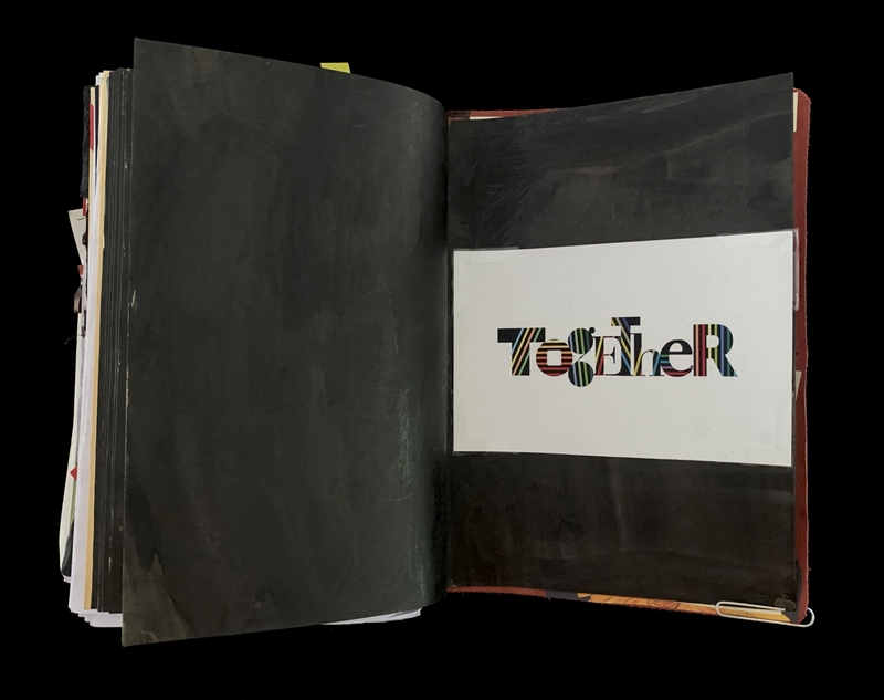 A black book page with the word "TOGETHER" prominently displayed in a colorful, fragmented font.