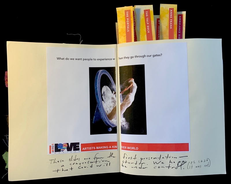 An open journal with printed and handwritten content, including a photo of a dancer and multiple colored tabs sticking out from the top.