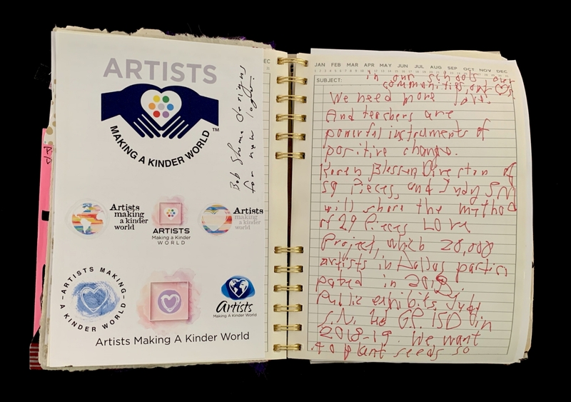 A page from a notebook featuring the "Artists Making a Kinder World" logo and handwritten notes.