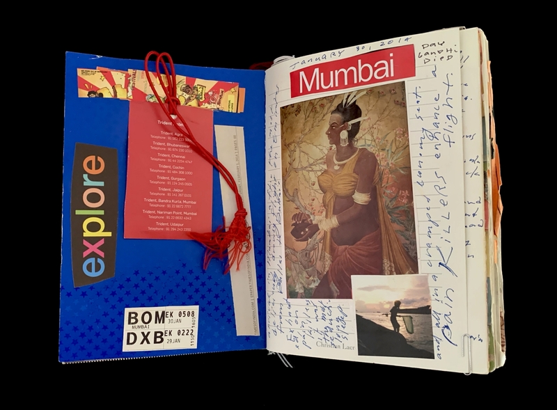 Open travel journal with a colorful page labeled "explore" and list of hotels, next to a "Mumbai" section with an artistic illustration and handwritten notes.