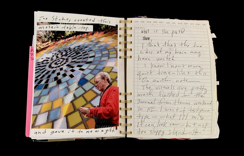 A journal page featuring a photograph of a mosaic table top and handwritten notes discussing the creator and personal reflections.