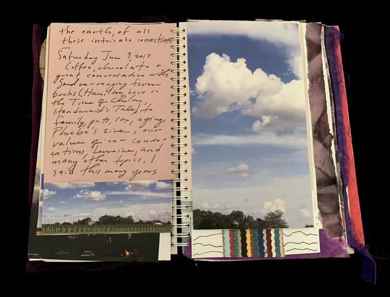 A journal entry with handwritten text and a photograph of a sky with clouds.