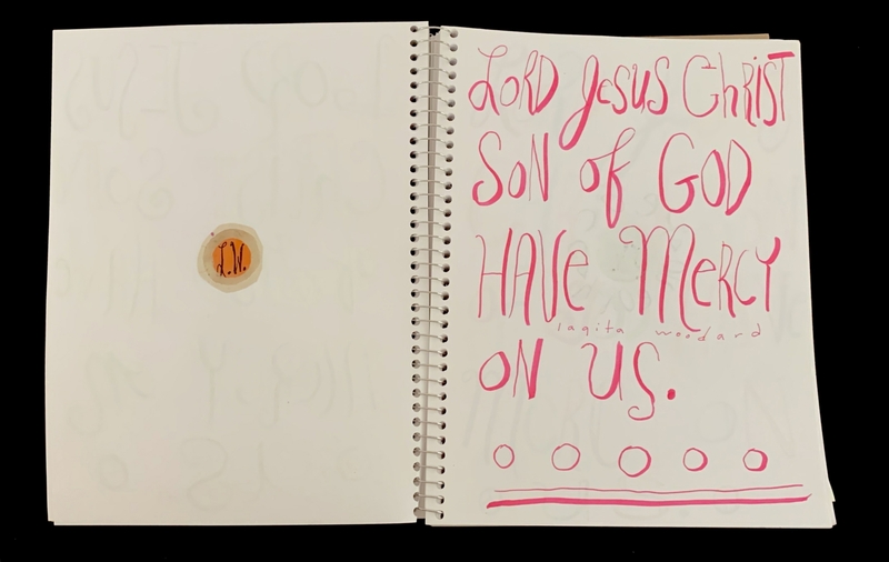 A handwritten prayer page featuring a circular design and a prayer to Jesus Christ.
