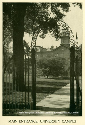 Old iron gate on R street with  in the distance. View Image