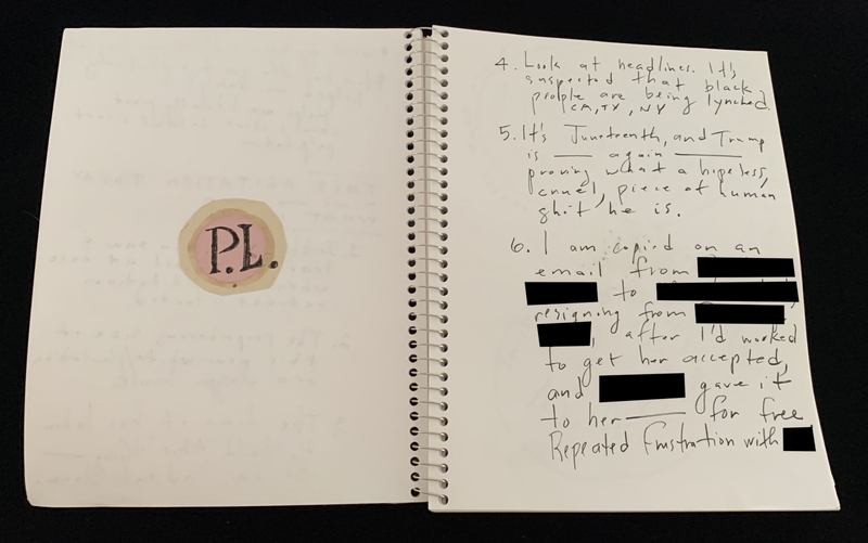 A handwritten page from a spiral-bound notebook with a circular sticker and some text entries.
