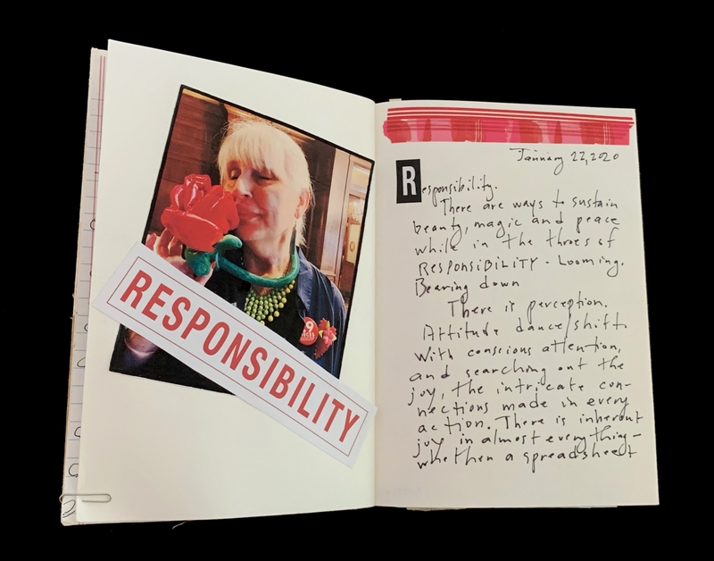 An open journal with a photo of a person smelling a red rose and handwritten notes about responsibility.