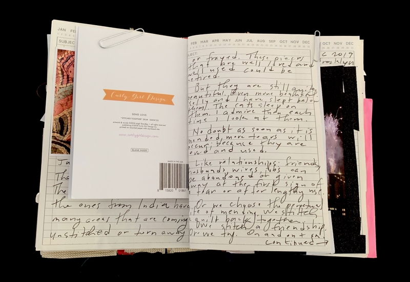 A handwritten journal page with various notes, a barcode, and a small image of fireworks.